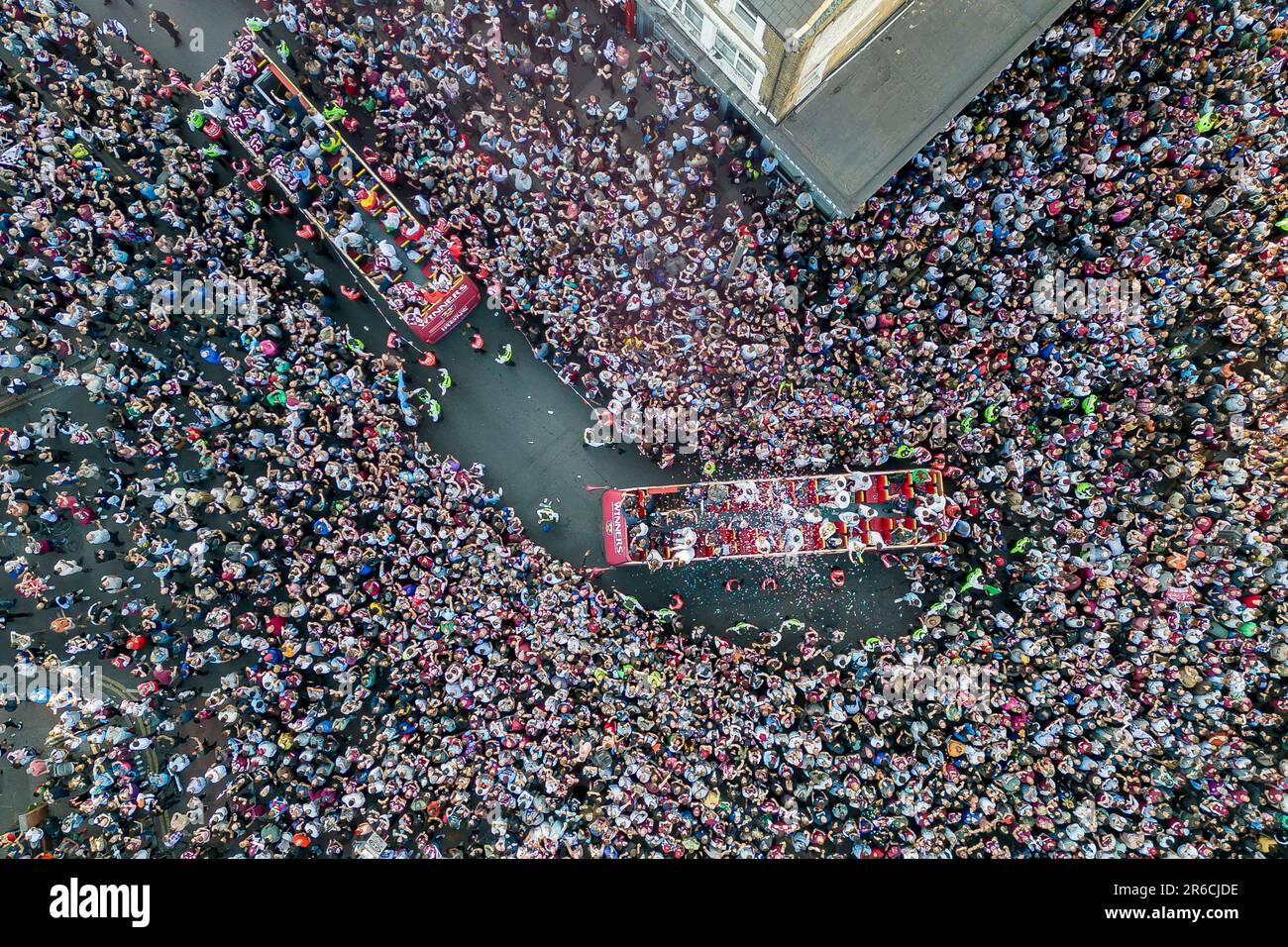 The busses make their way past the Boleyn Pub during the West Ham United Trophy Parade after their UEFA Europa Conference League final win in Stratford on June 8th 2023 in London, United Kingdom. (Photo by Daniel Chesterton/phcimages.com) Credit: PHC Images/Alamy Live News Stock Photo