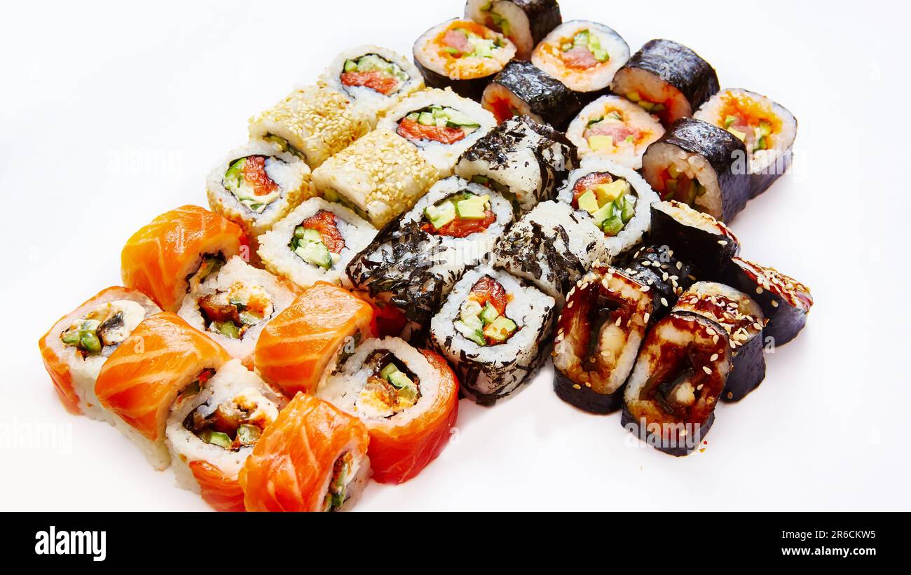 Set of sushi roll with salmon, avocado, cream cheese, cucumber, rice