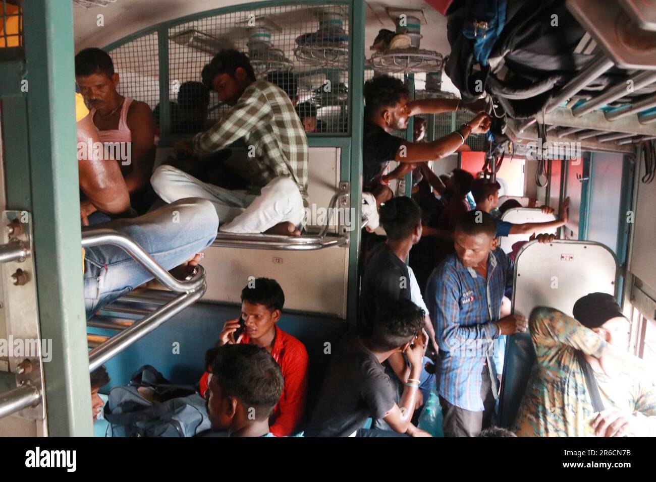 June 8, 2023, Kolkata, India: Passengers aboard the Coromandel Express sit crammed in the corner of a bogey at Shalimar station near Kolkata on June 8, 2023.One of the train services involved in a triple collision in India's deadliest railway disaster in decades resumed journeys. Odisha State Goverment Chief Secretary Pradeep Kumar Jena said: 'We have asked the Balasore collector to compile the details of bodies recovered from the tracks, those died in the hospitals. After compiling all, the collectors today informed us that the final death toll is 288. on June 8, 2023 in Kolkata, India. (Ph Stock Photo