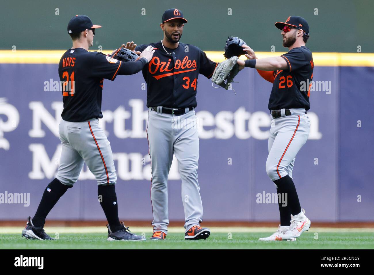 MILWAUKEE, WI - JUNE 08: Baltimore Orioles left fielder Austin Hays (21),  center fielder Aaron Hicks (34) and right fielder Ryan McKenna (26)  celebrate after the final out in the ninth inning