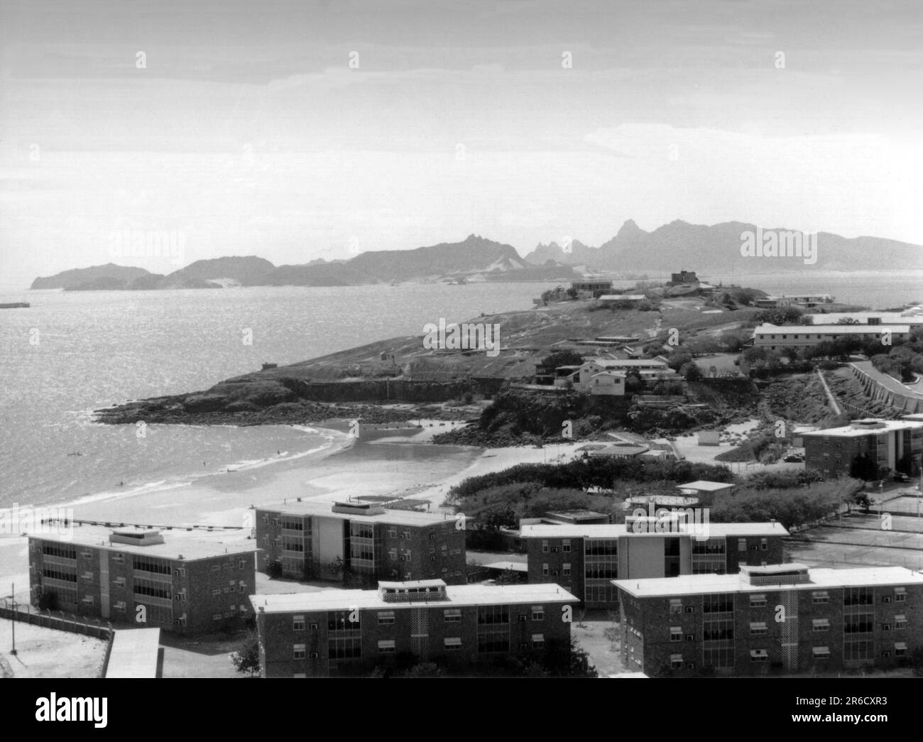 Aden town and bay with family apartments and Fort Mobat on the  hill middle distance during the handover in 1967 Stock Photo