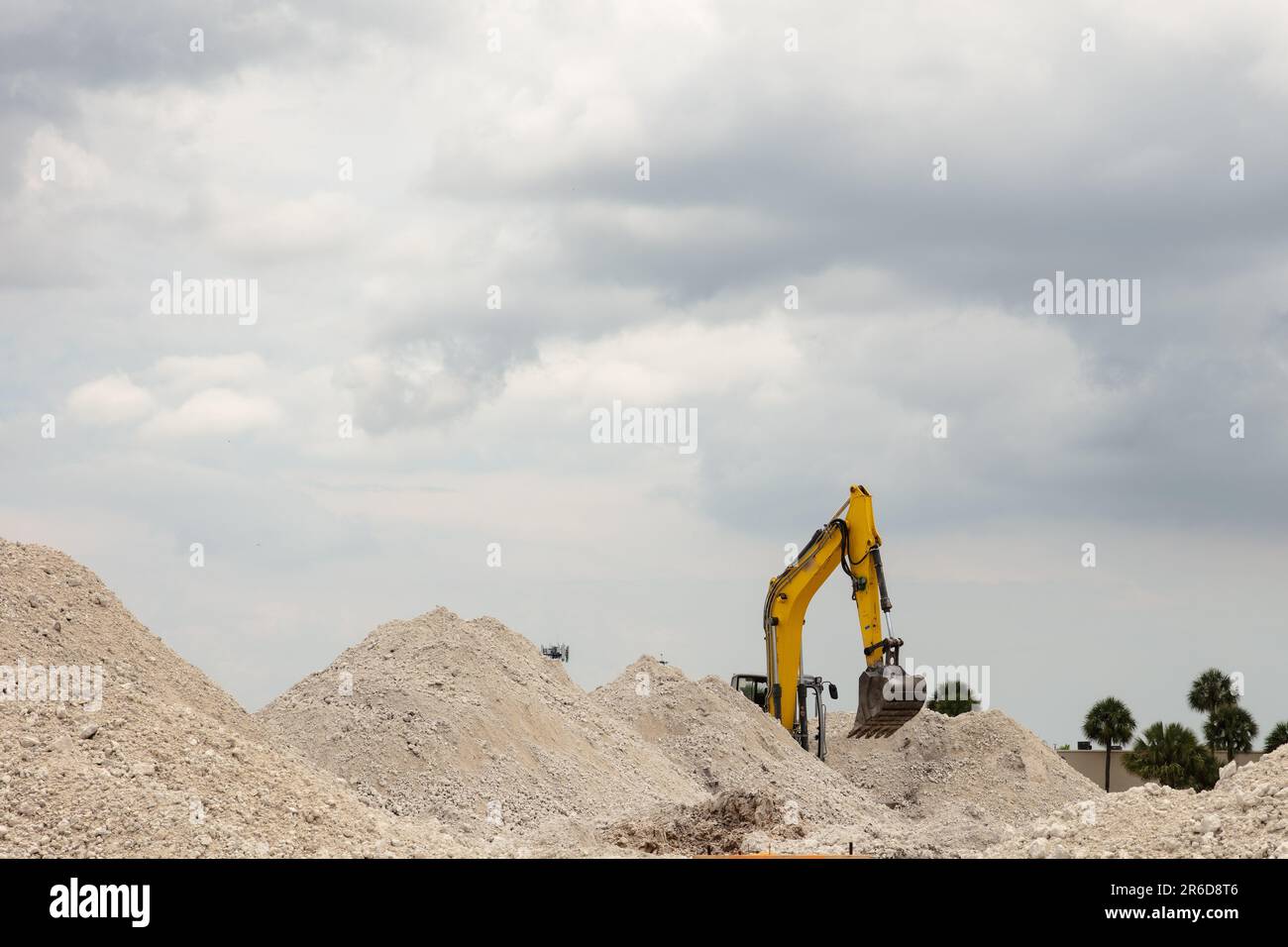 Yellow excavator digging soil hi-res stock photography and images - Alamy