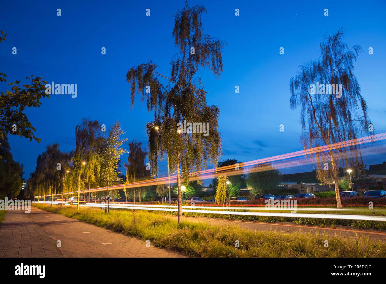 Abstract light trails road yellow hi-res stock photography and images ...