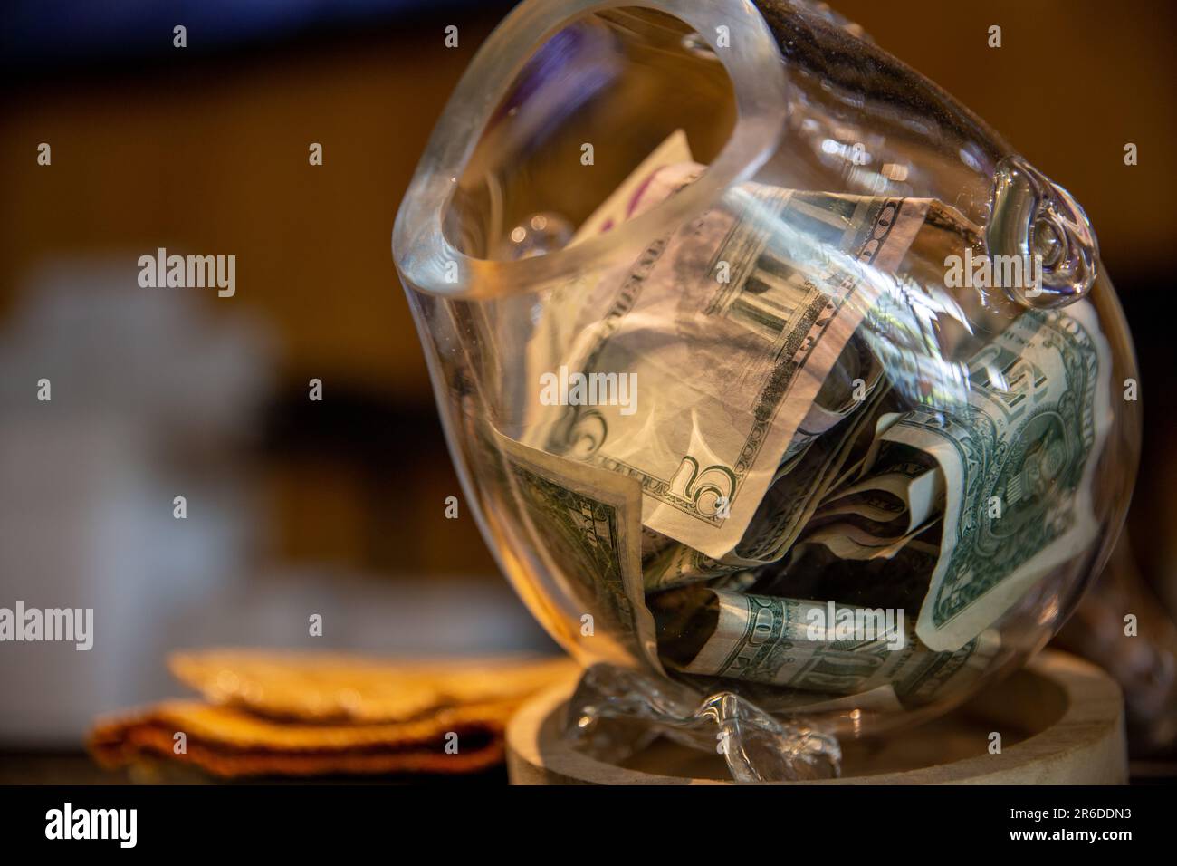 Filled Tip Jar at a Japanese Restaurant Stock Photo Alamy
