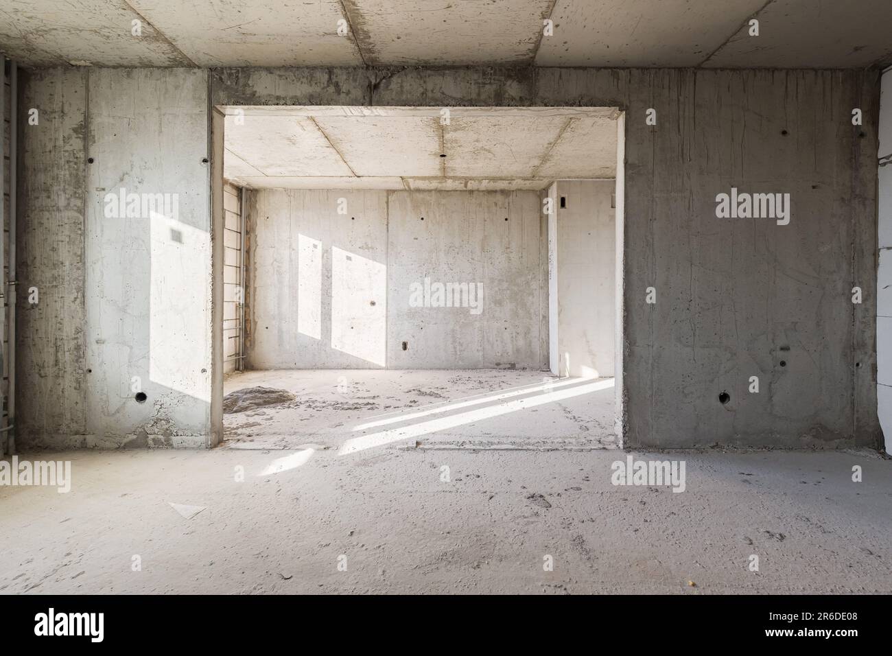 Empty concrete commercial space without finishing with partitions Stock