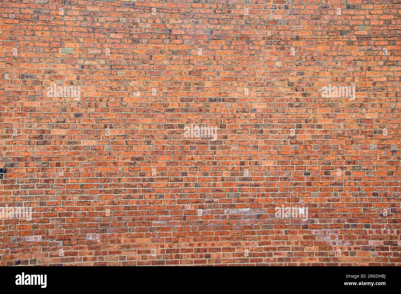 Large red brick wall full frame, copy space Stock Photo