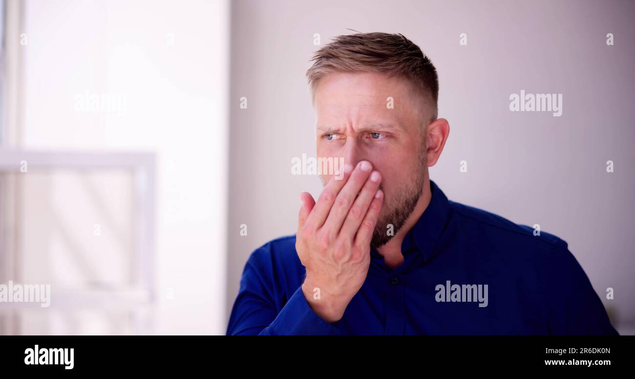 Bad Smell Dental Breath And Hand Near Mouth And Face Stock Photo Alamy