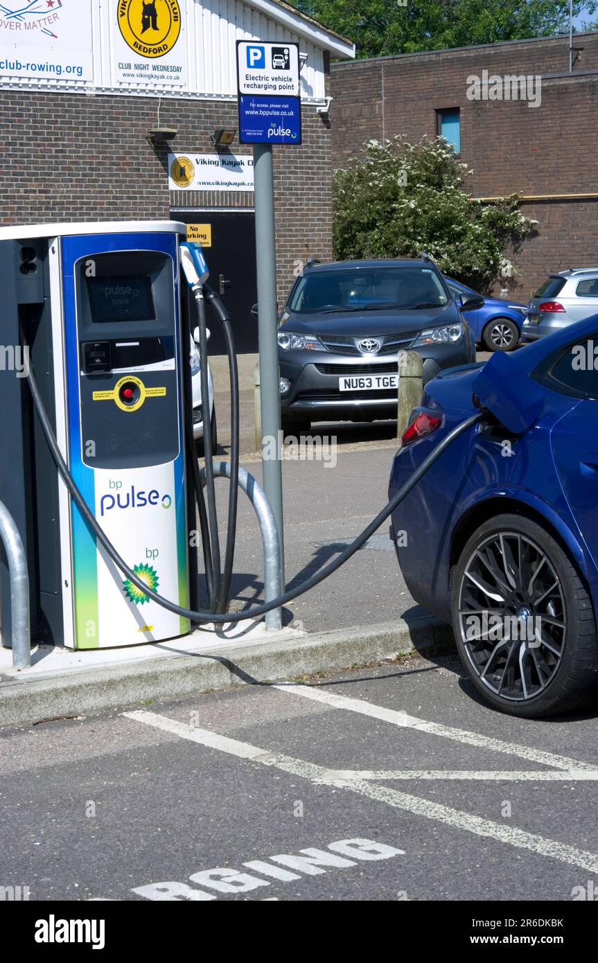 Car Being Charged Stock Photo