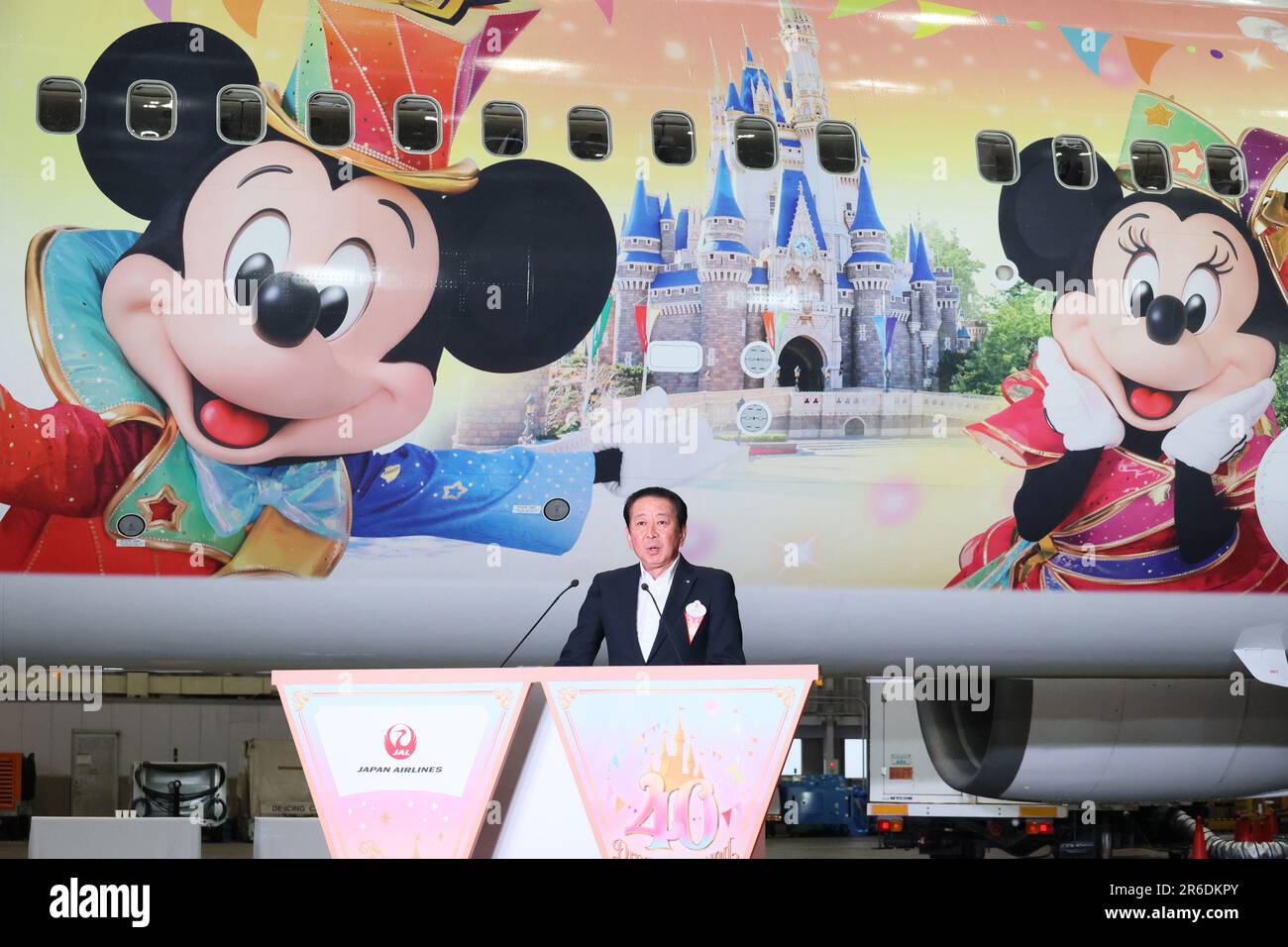 Tokyo, Japan. 9th June, 2023. Tokyo Disney Resort operator Oriental Land president Kenji Yoshida delivers a speech as Oriental Land and Japan Airlines (JAL) display the 'JAL Colorful Dreams Express' jetliner to celebrate the Disneyland's 40th anniversary at a JAL hangar at the Haneda airport in Tokyo on Friday, June 9, 2023. The new Disney characters designed Boeing 767 launched JAL's domestic routes. (photo by Yoshio Tsunoda/AFLO) Stock Photo