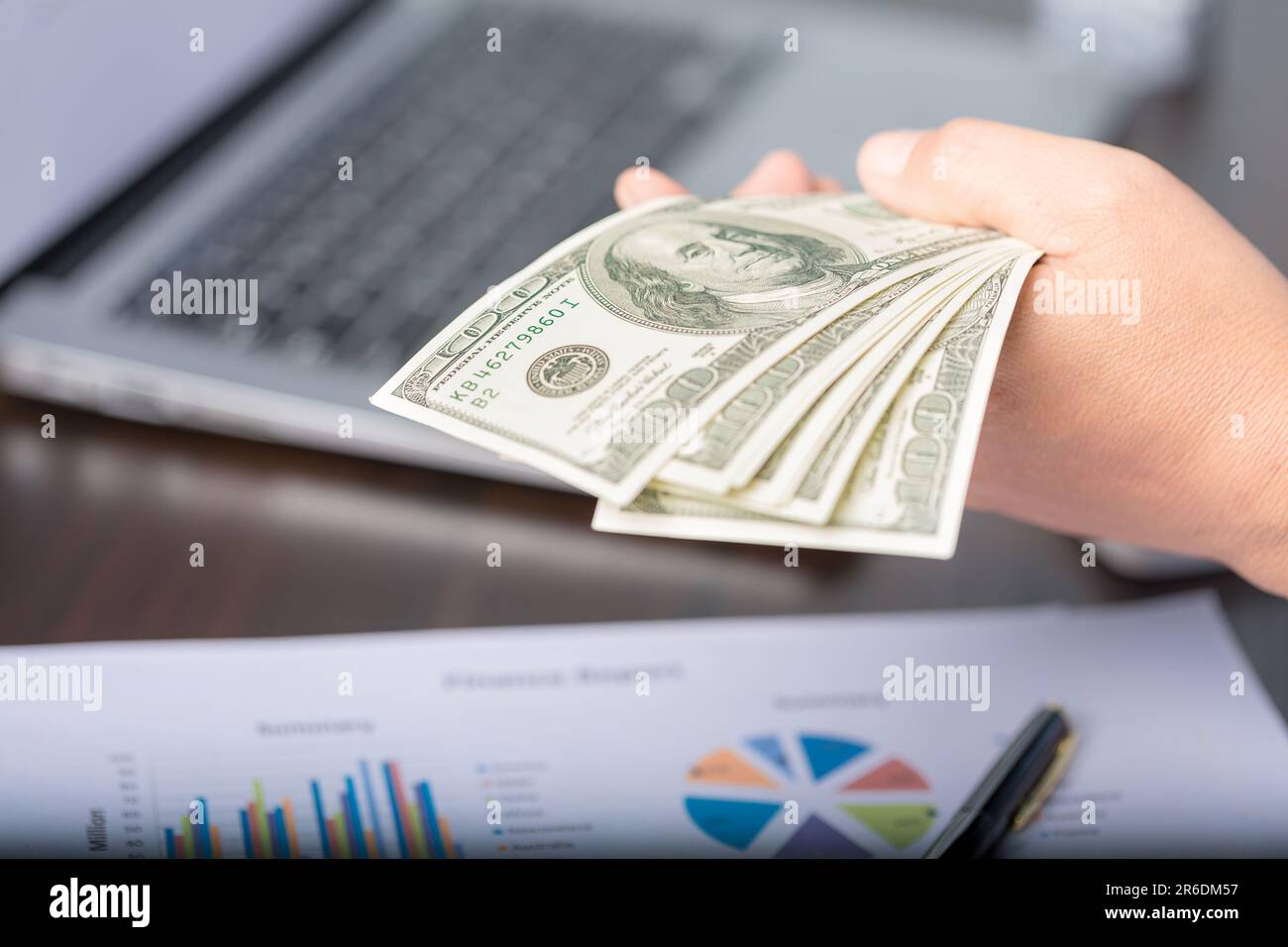 Close up young business woman using counting cash money one hundred ...