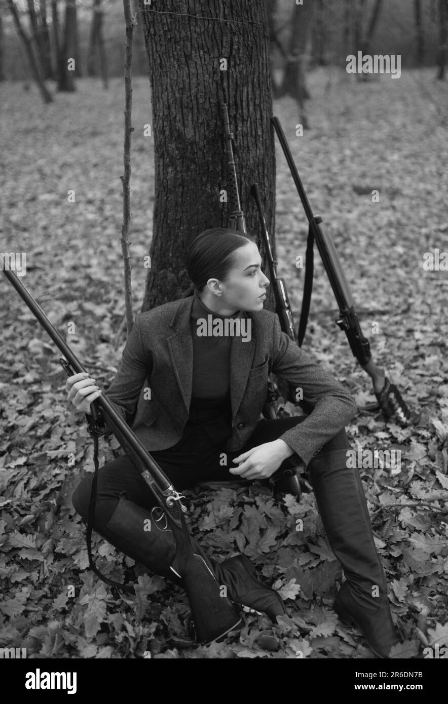 successful hunt. hunting sport. woman with weapon. Target shot. girl with rifle. chase hunting. Gun shop. female hunter in forest. military fashion Stock Photo