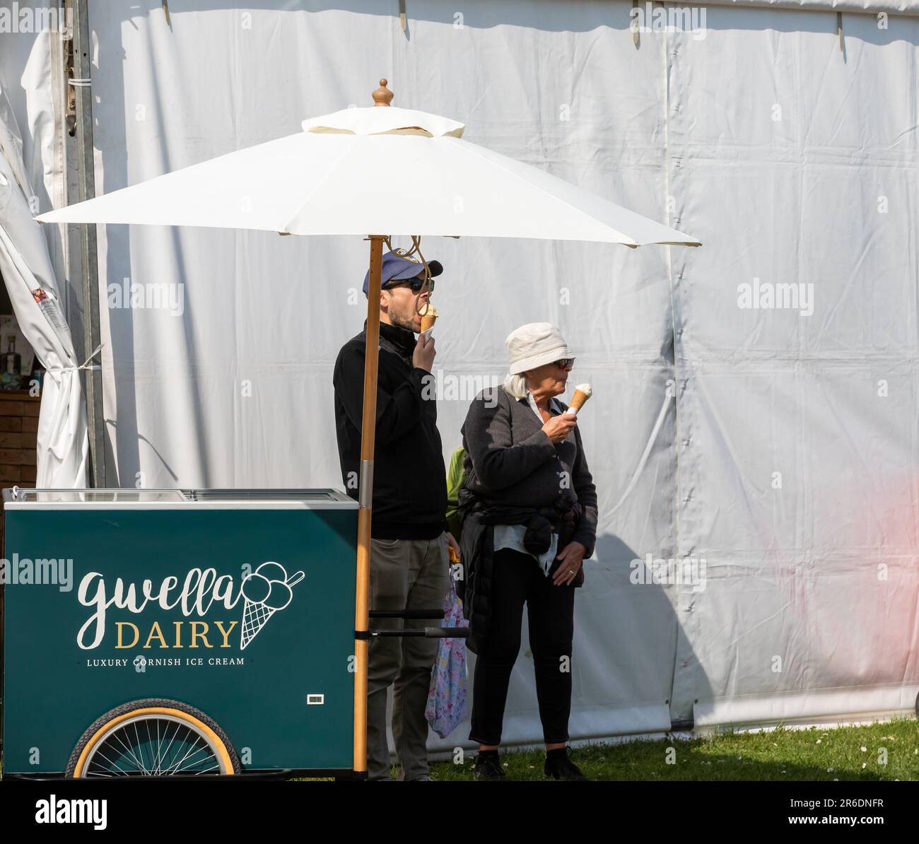 Two people eating an ice cream at The Royal Cornwall Show, Wadebridge