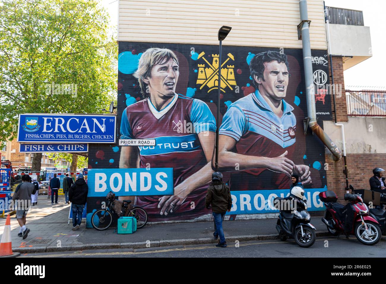 Large mural street art painting of Billy Bonds and Trevor Brooking in Newham near the old West Ham Utd football ground Upton Park Stock Photo
