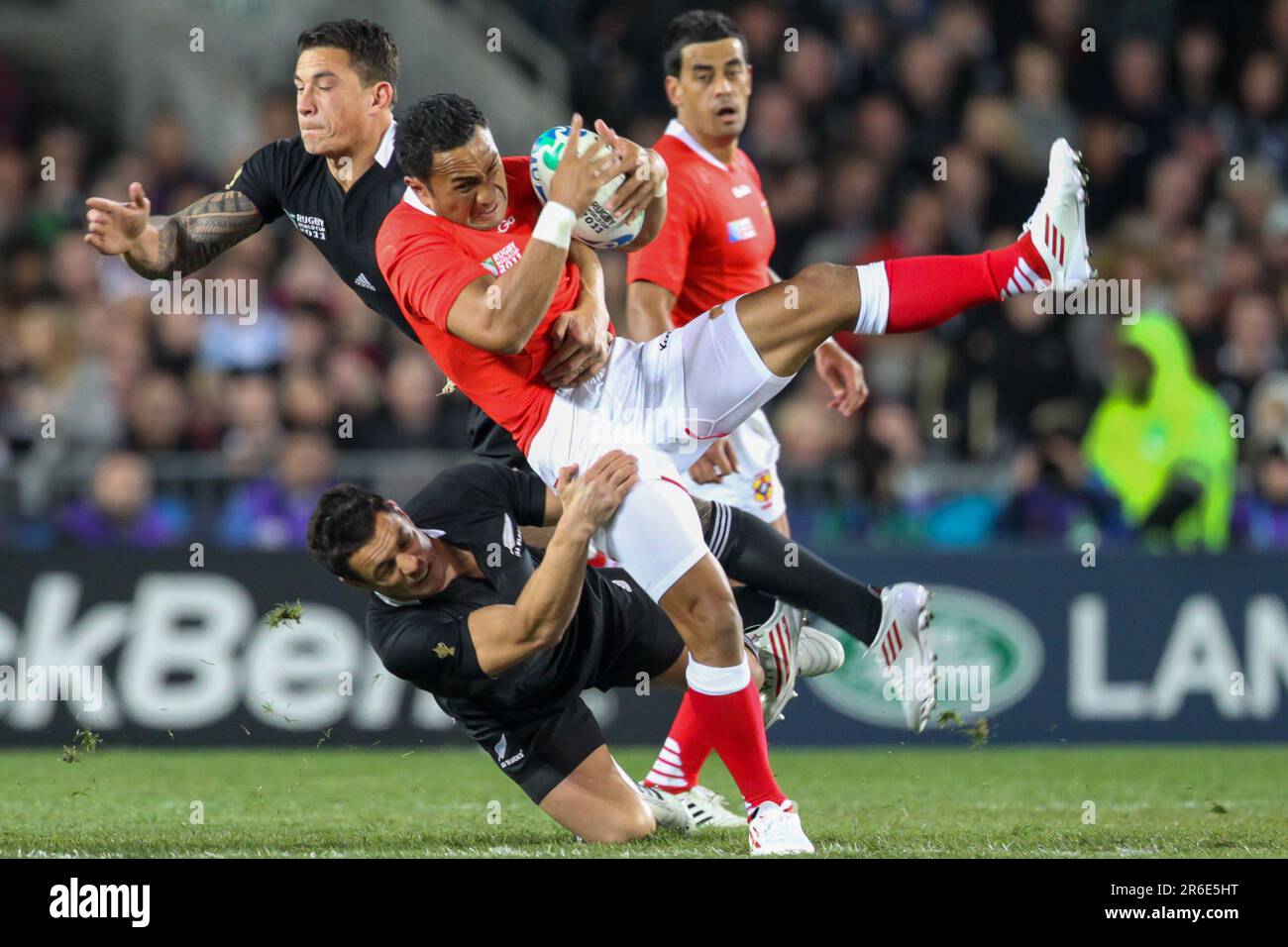 New Zealand's Sonny Bill Williams and Daniel Carter  bring down Tonga's  Andre Ma'ilei during the opening match of the Rugby World Cup 2011, Eden Park, Auckland, New Zealand, Friday, September 09, 2011. Stock Photo