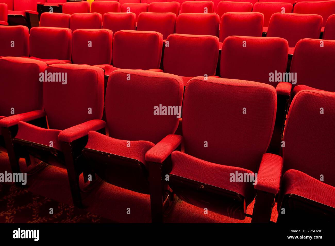 Empty red theater seats Stock Photo - Alamy