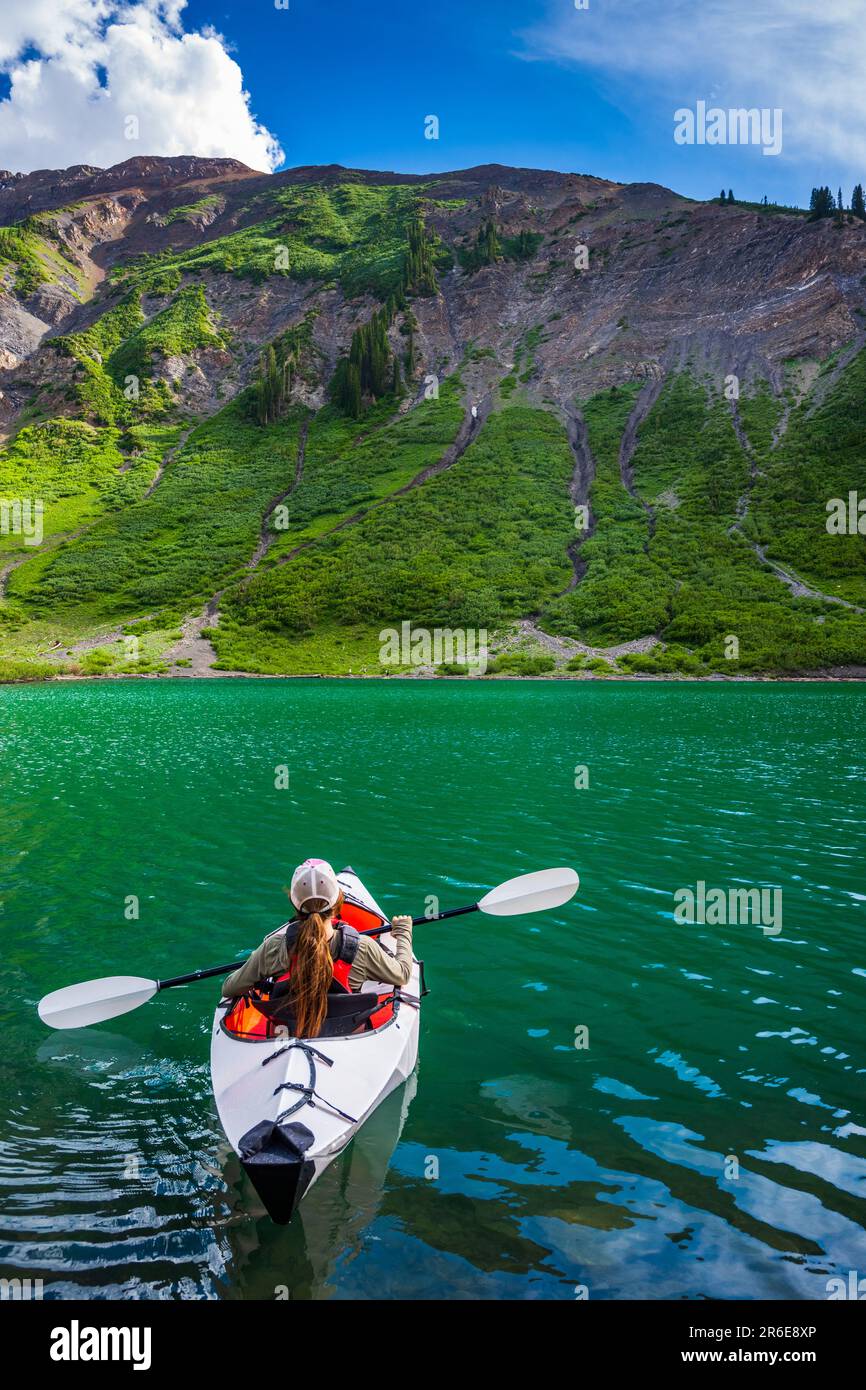 Woman Kayaking In Crested Butte, Colorado Stock Photo