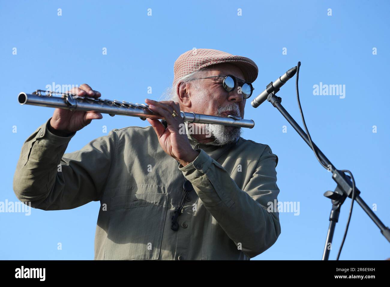 The jazz saxophonist, Charles Lloyd, with the flute, during the concert