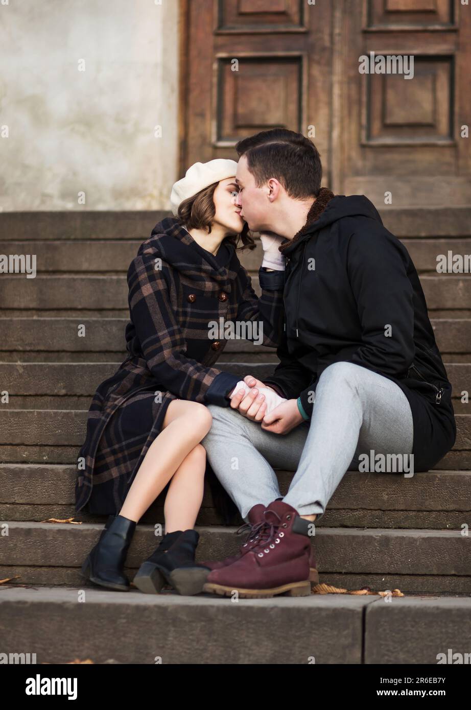 Old woman and young man kissing hi-res stock photography and images - Alamy