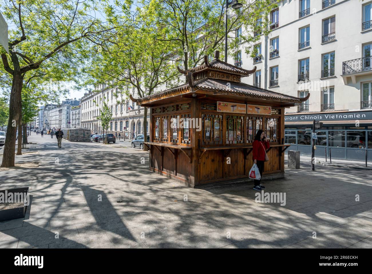 Paris, France - 05 20 2023: View of the facade of a typical wooden chinese kiosk Stock Photo