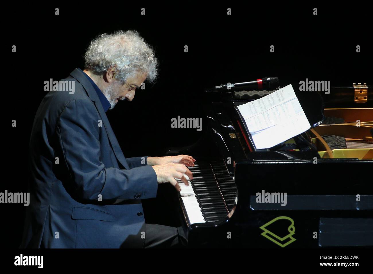 The musician and composer, Nicola Piovani, during the concert at the Trianon Viviani theater in Naples. Stock Photo