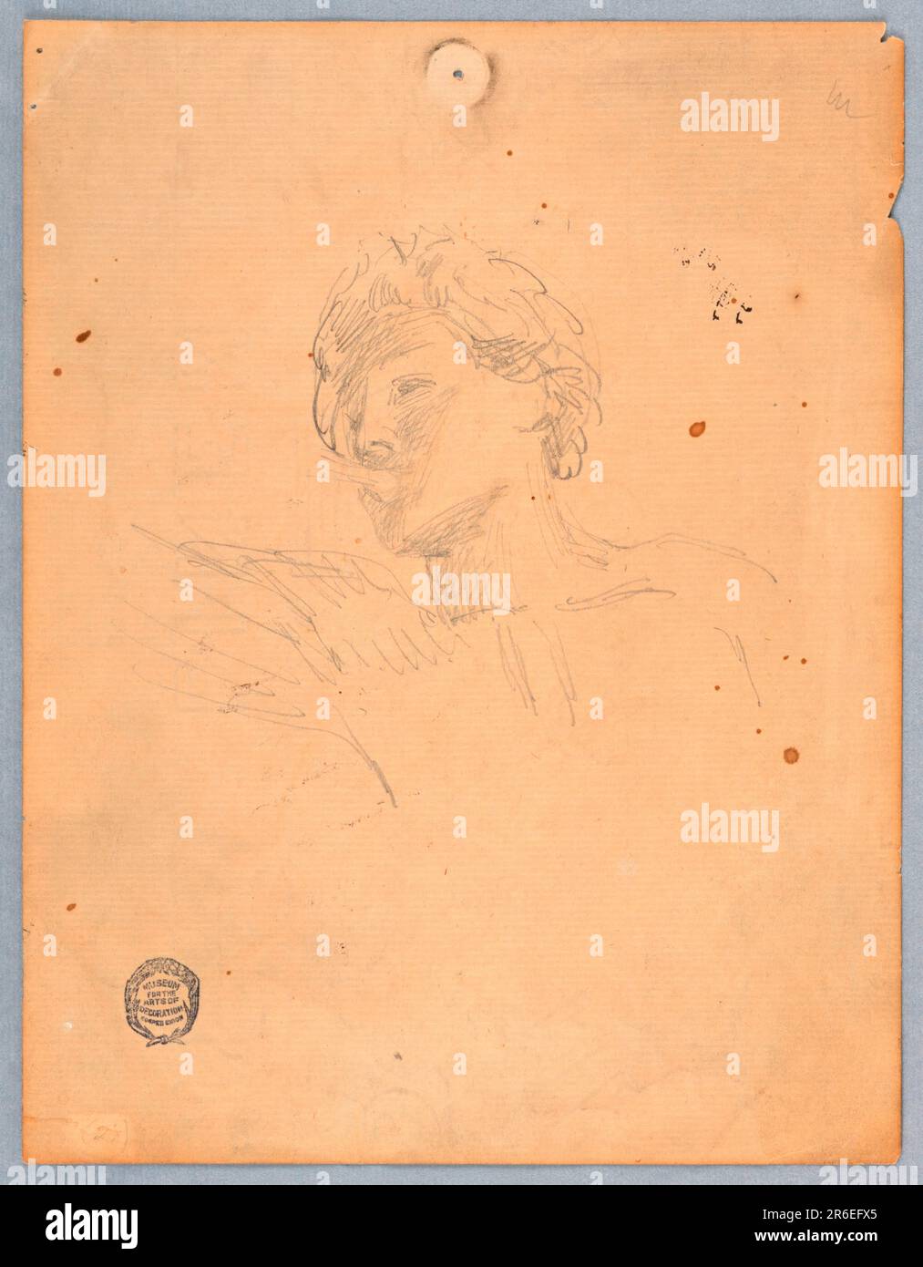 Shown turned to left and blowing a trumpet. The bust and part of the