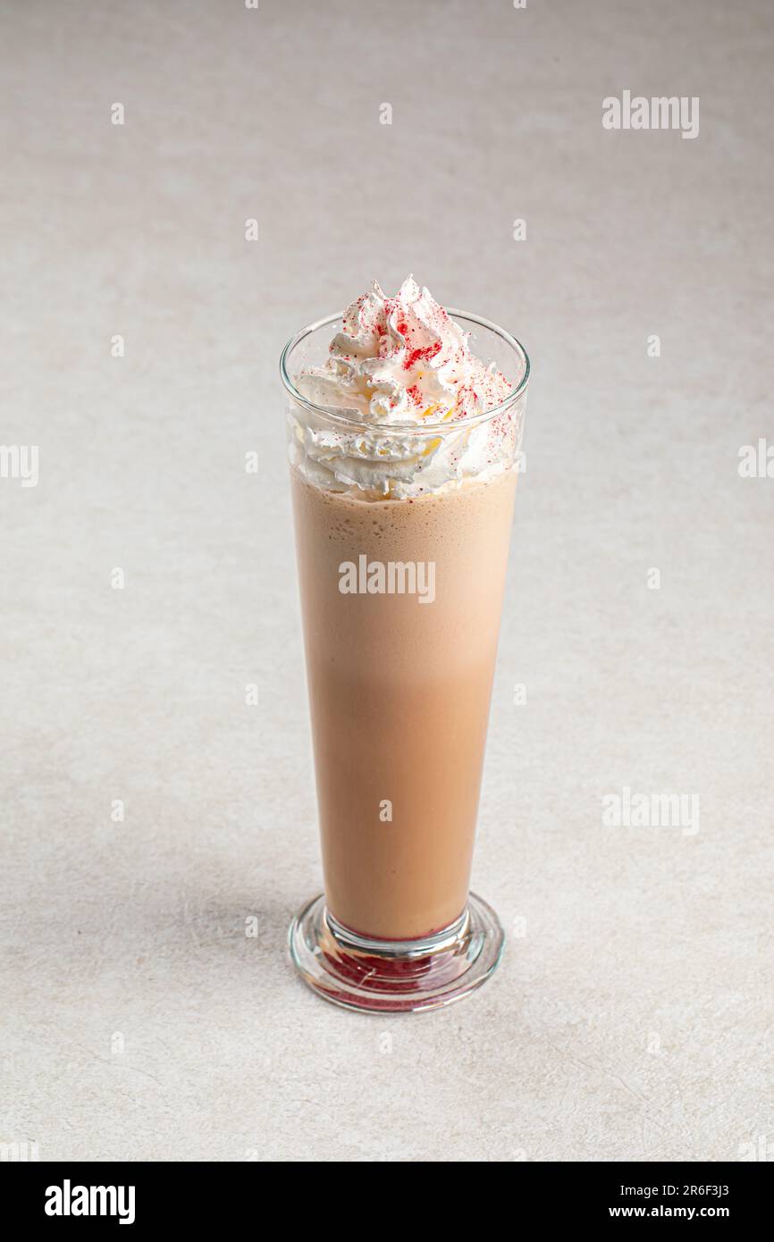 Portion of sweet frapuccino with whipped cream Stock Photo