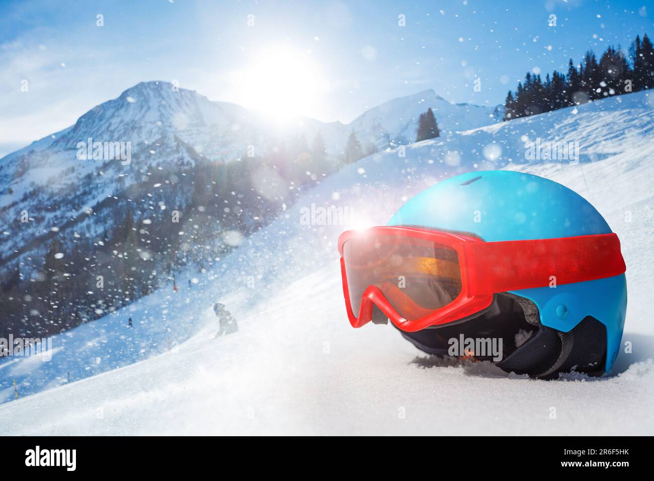 Helmet for kids with red alpine mask and mountains in background Stock ...