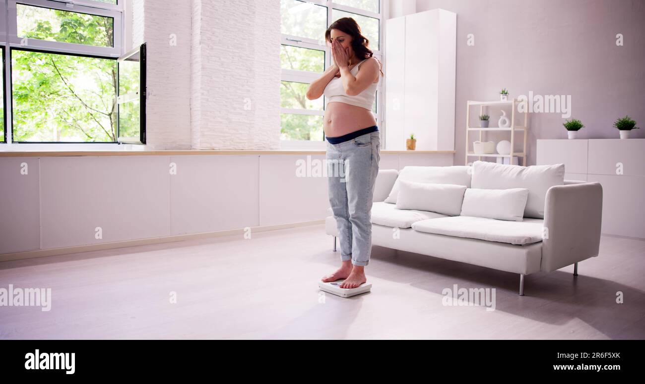 Shocked Pregnant With Body Weight Gain. Food And Diet Stock Photo Alamy