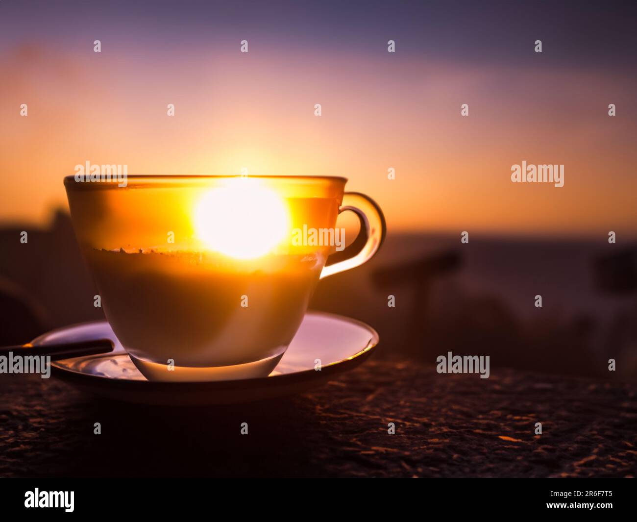 a cup of coffee sitting on top of a saucer. . Stock Photo