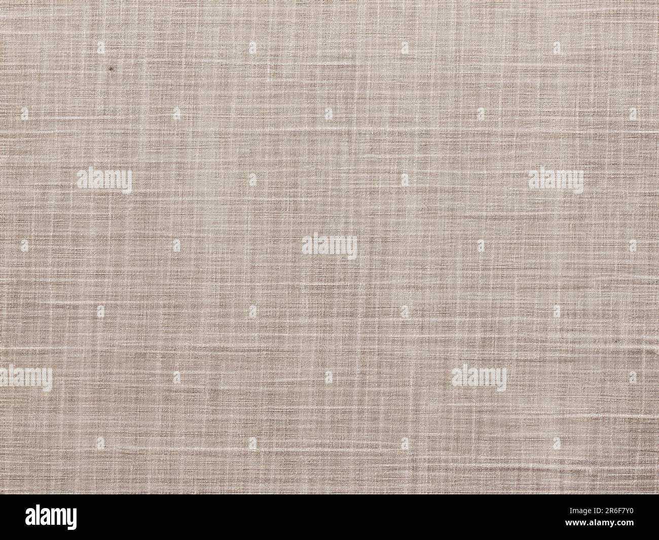 a beige cloth textured with a thin line pattern for a background. . Stock Photo