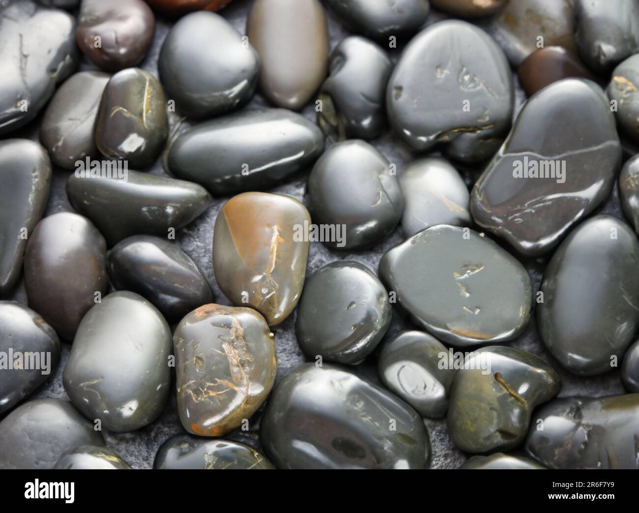 a close up of a bunch of rocks with different colors. . Stock Photo