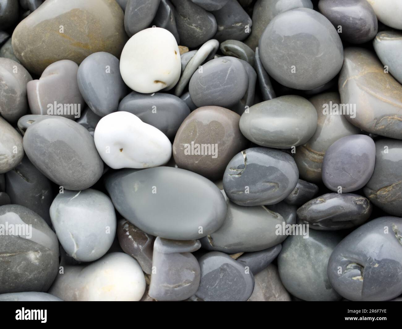 a pile of rocks with white and gray rocks on top. . Stock Photo