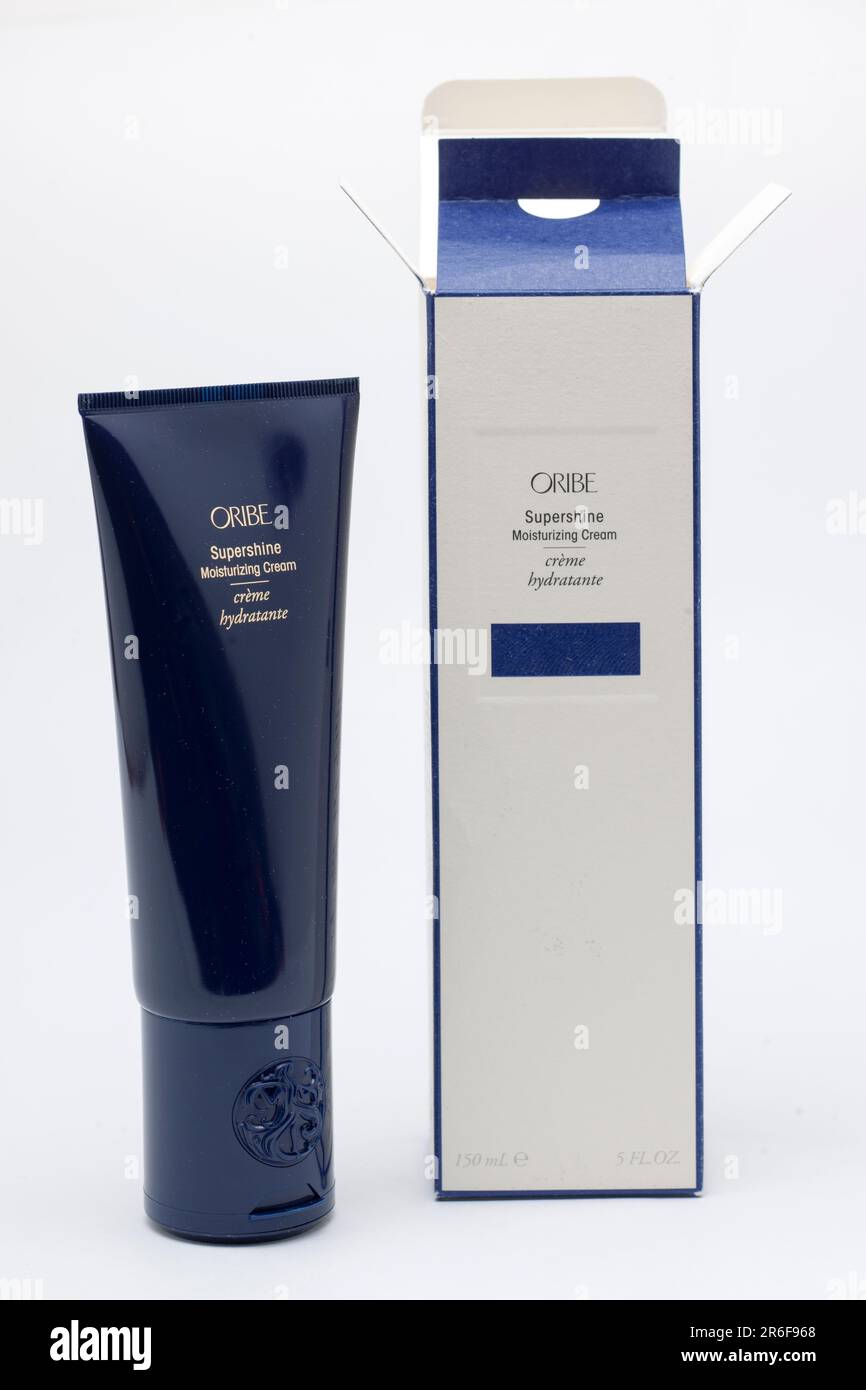 Tube and Box of Oribe Supershine Moisturizing Cream Leave in Hair Conditioner Stock Photo