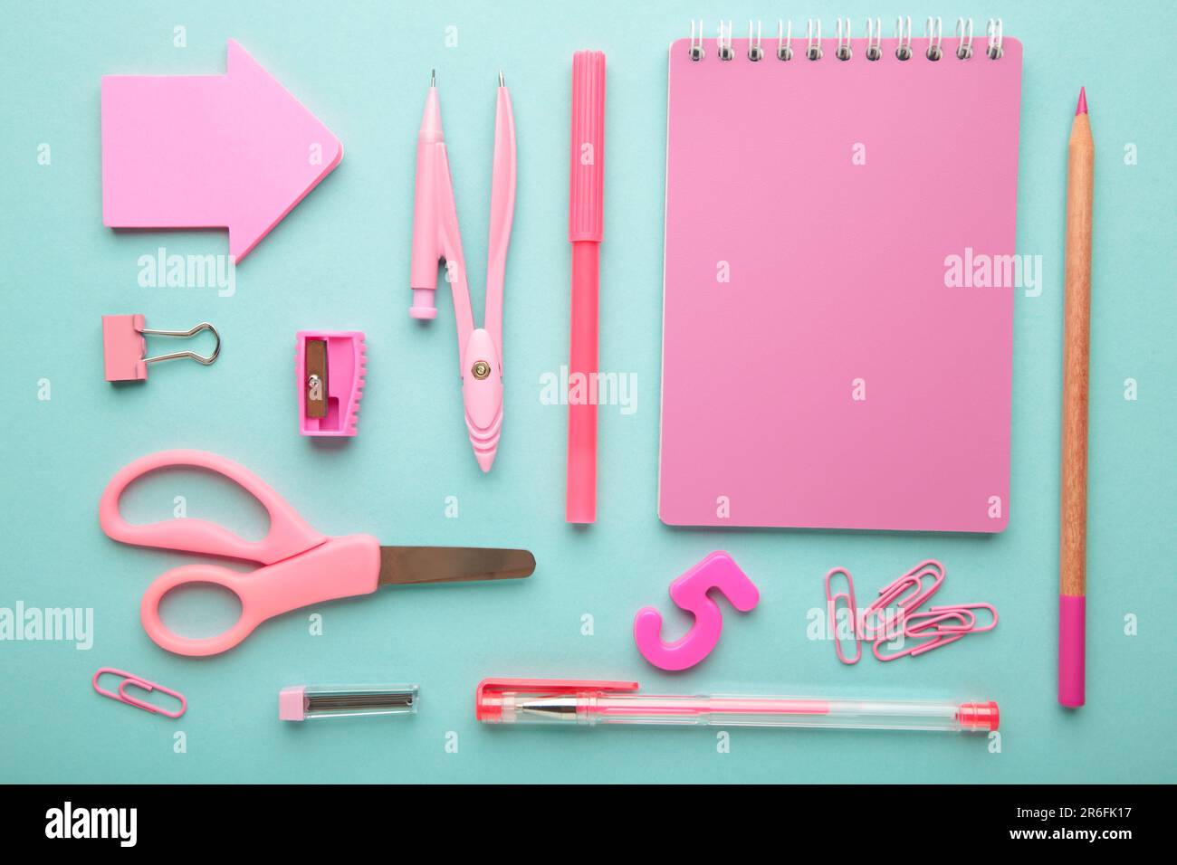 Pink school supplies on blue background. Back to school concept. Top view  Stock Photo - Alamy