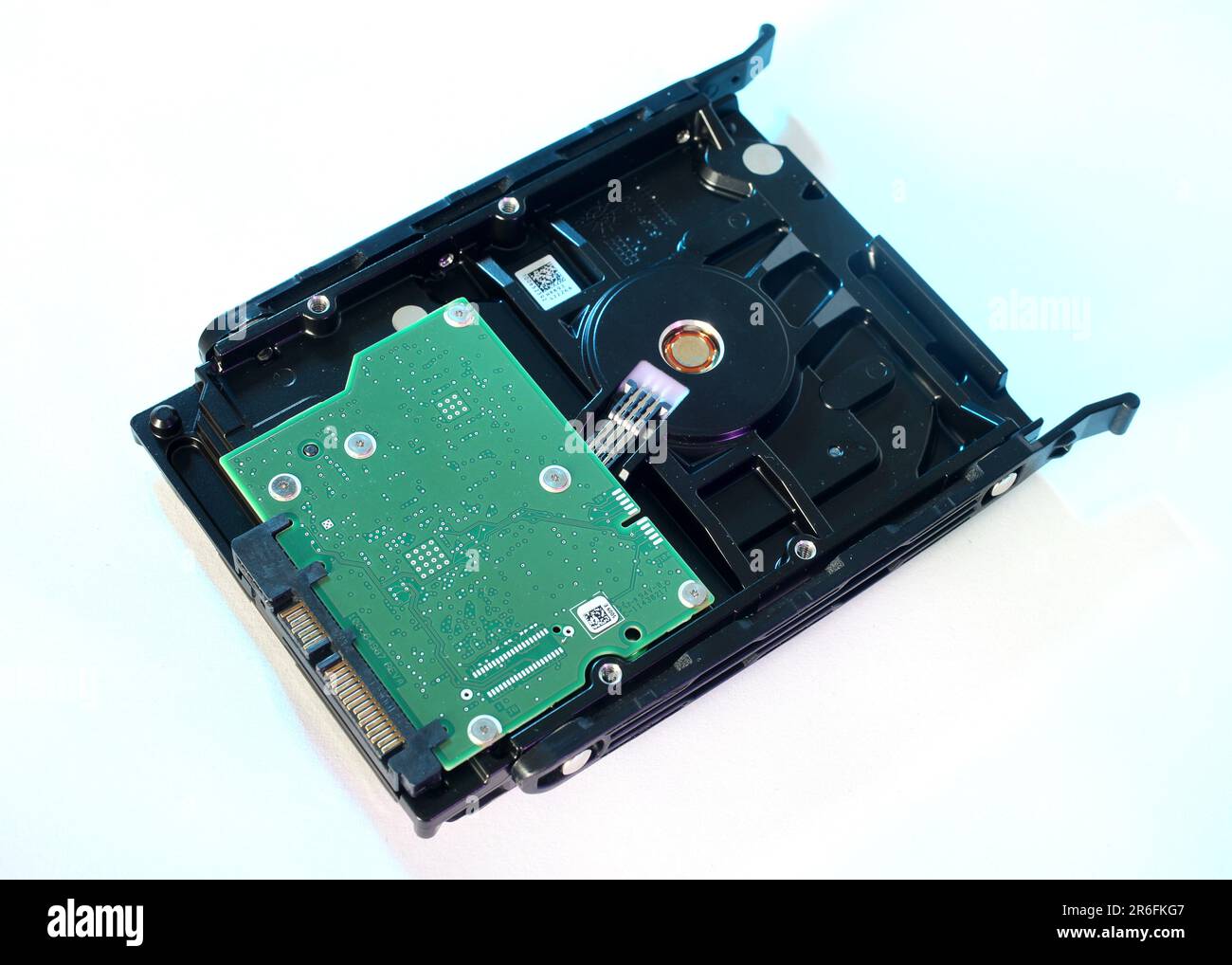 A PC hard drive removed from a computer Stock Photo