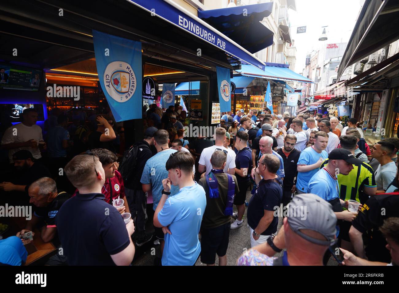 Man City fans outside a pub in central Istanbul, ahead of Saturday's UEFA Champions League Final between Manchester City and Inter Milan at the Ataturk Olympic Stadium. Stock Photo