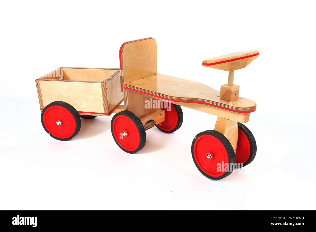 A wooden ride on toy with trailer Stock Photo Alamy