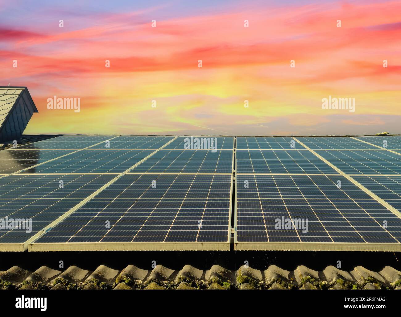 Solar panels producing clean energy on a roof of a residential house ...
