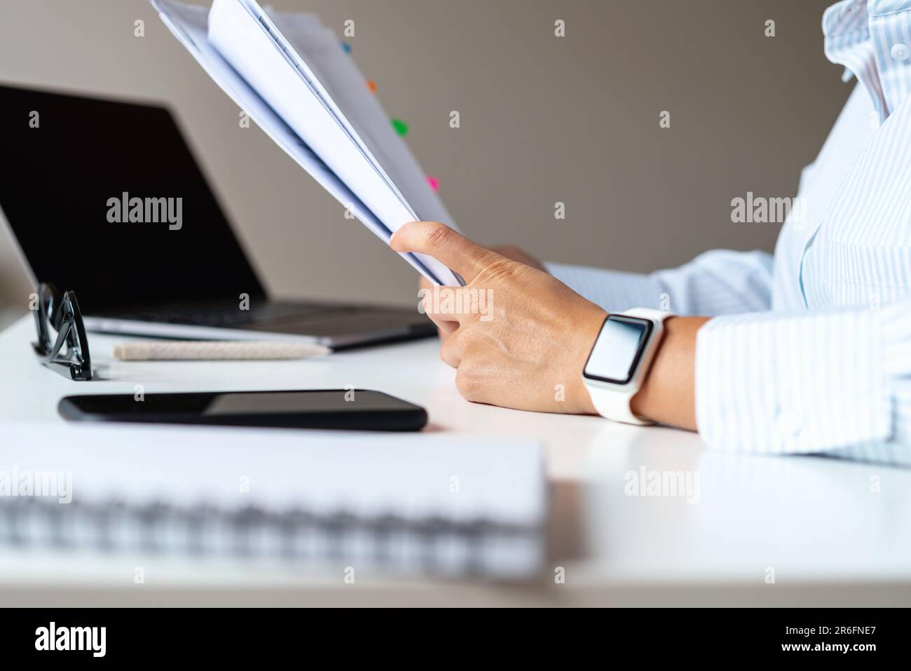 Financial documents in the hands of an accountant. Stock Photo