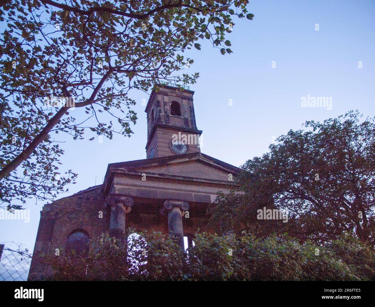 Sheerness, Kent, UK. 9th June, 2023. [FILE PIC of ruins from July 2009] Python Michael Palin's son Will has rescued a church from its fire-damaged ruins back in 2001, in an amazing turnaround transformation. The £9.5 million restoration of Sheerness Dockyard Church in Kent has seen the burnt out shell transformed into a business hub for young people due to open in July. The historic naval church (part of the former Royal Dockyard) is situated at the entrance to Sheerness Docks. Credit: James Bell/Alamy Live News Stock Photo