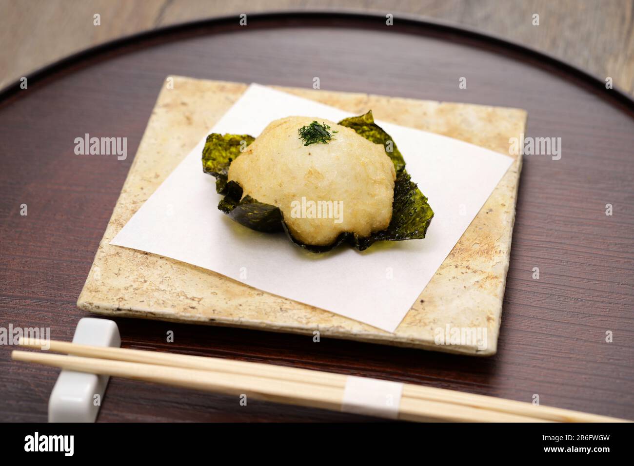 Yamaimo no isobe-age ( Grate Japanese yam and put it on top of Nori seaweed and then deep-fried ), Japanese cuisine Stock Photo