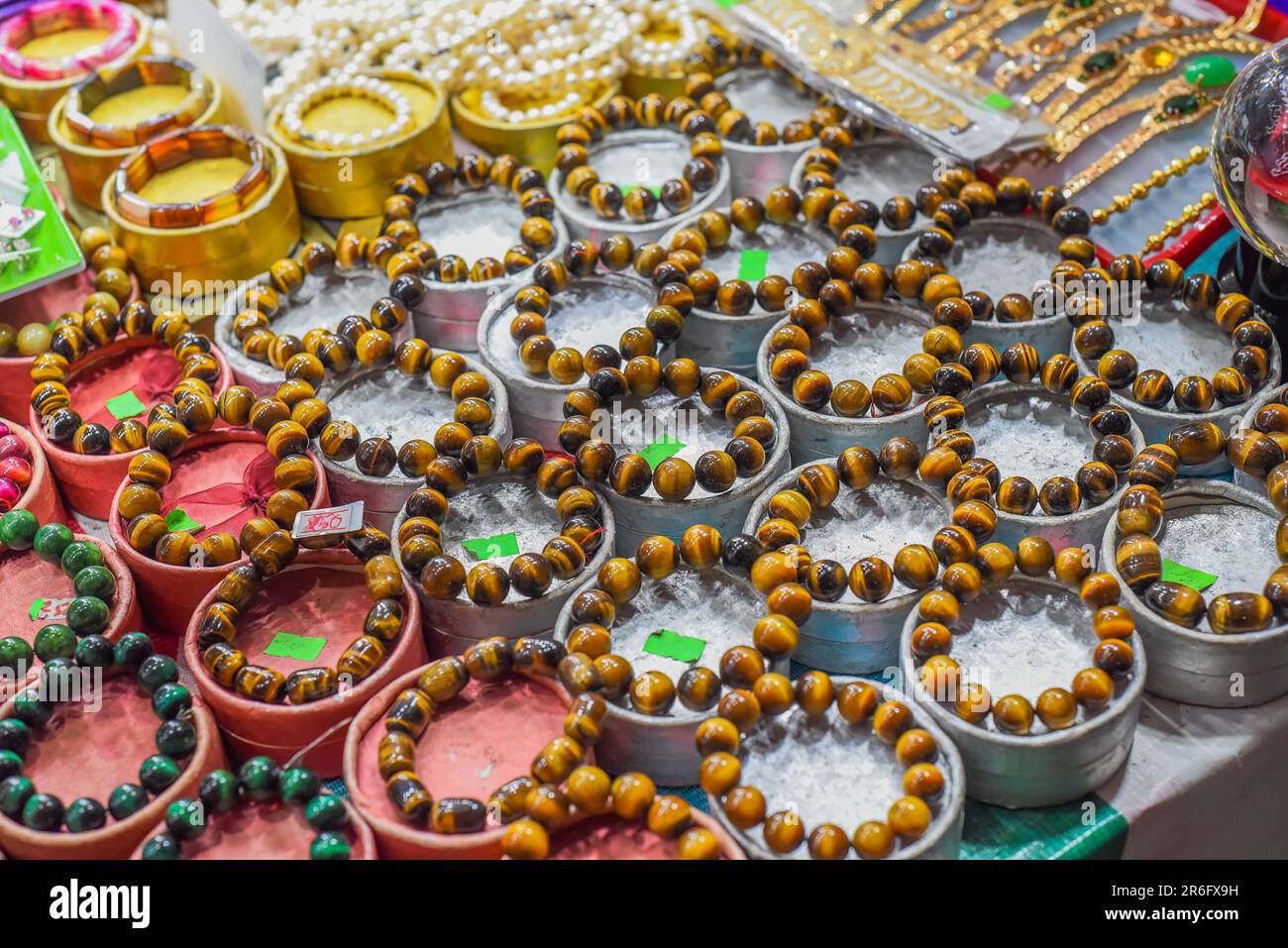 Many bodhi tree rosary bracelets with wooden beads in the vietnamese market Stock Photo Alamy