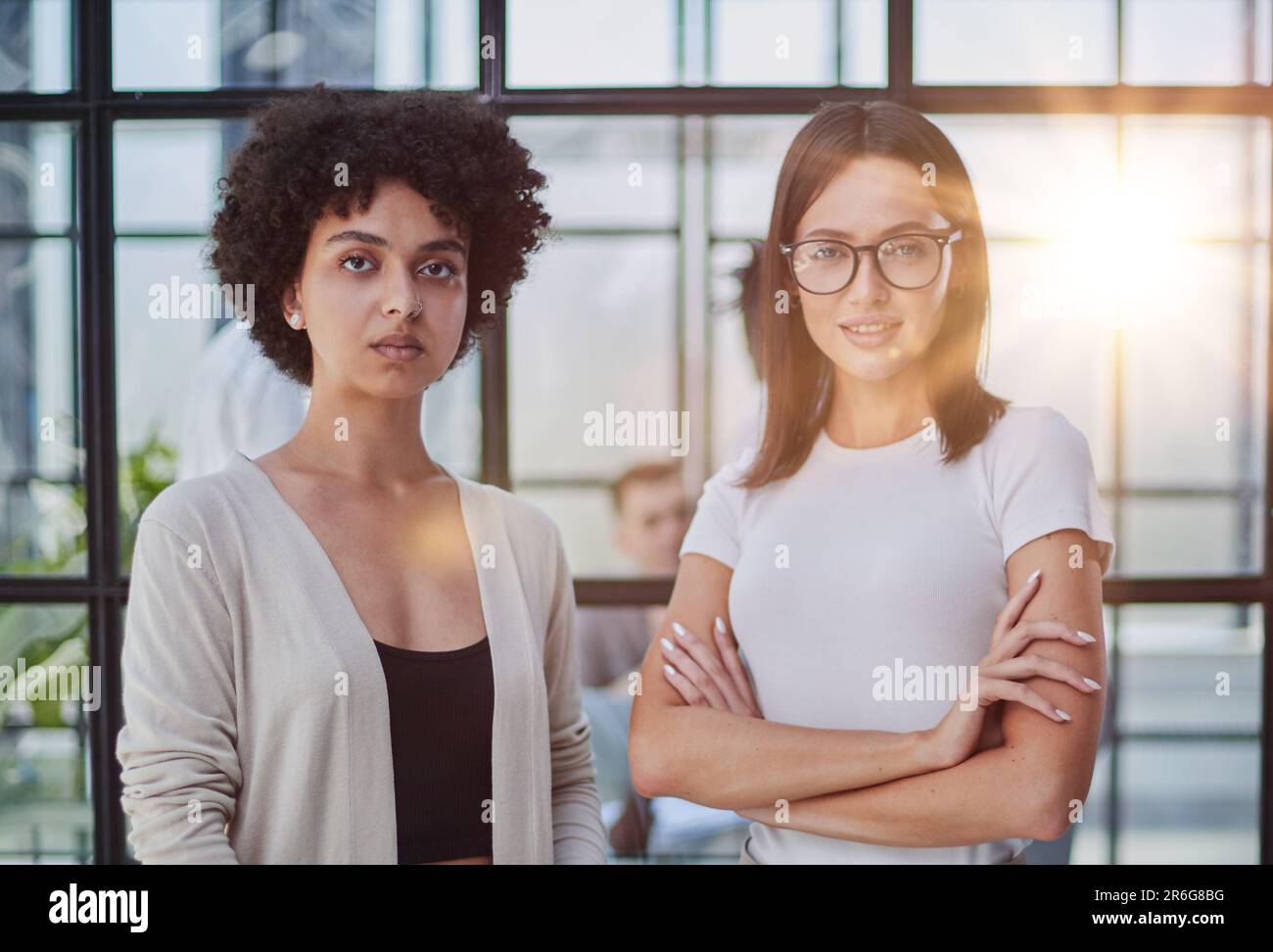Businesswomen Having Informal Meeting In Modern Office Stock Photo - Alamy