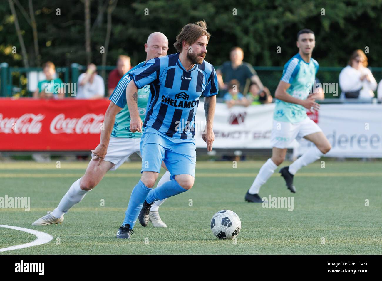 Gent, Belgium. 09th June, 2023. Actor Kevin Janssens and Rocky Peeters fight for the ball during a celebrity match at the eve of the 'Kevin de Bruyne Cup' youth soccer tournament for U15 teams, Friday 09 June 2023 in Drongen, Gent. BELGA PHOTO KURT DESPLENTER Credit: Belga News Agency/Alamy Live News Stock Photo