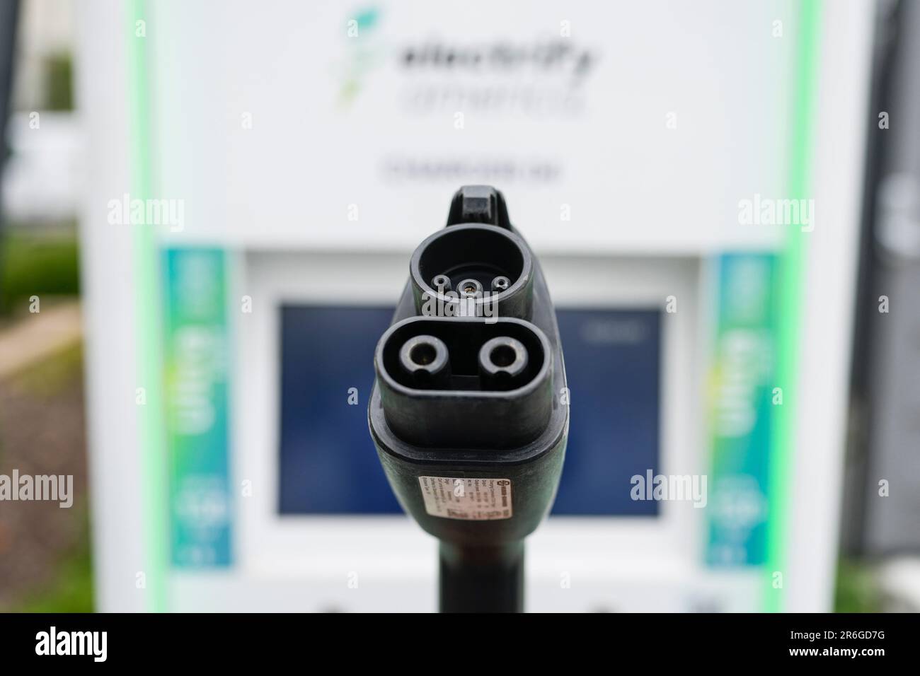 A Combined Charging System (CCS) plug is photographed at an EV charging  station in Anaheim, Calif., Friday, June 9, 2023. Currently in the U.S.  there mainly are two types of EV charging