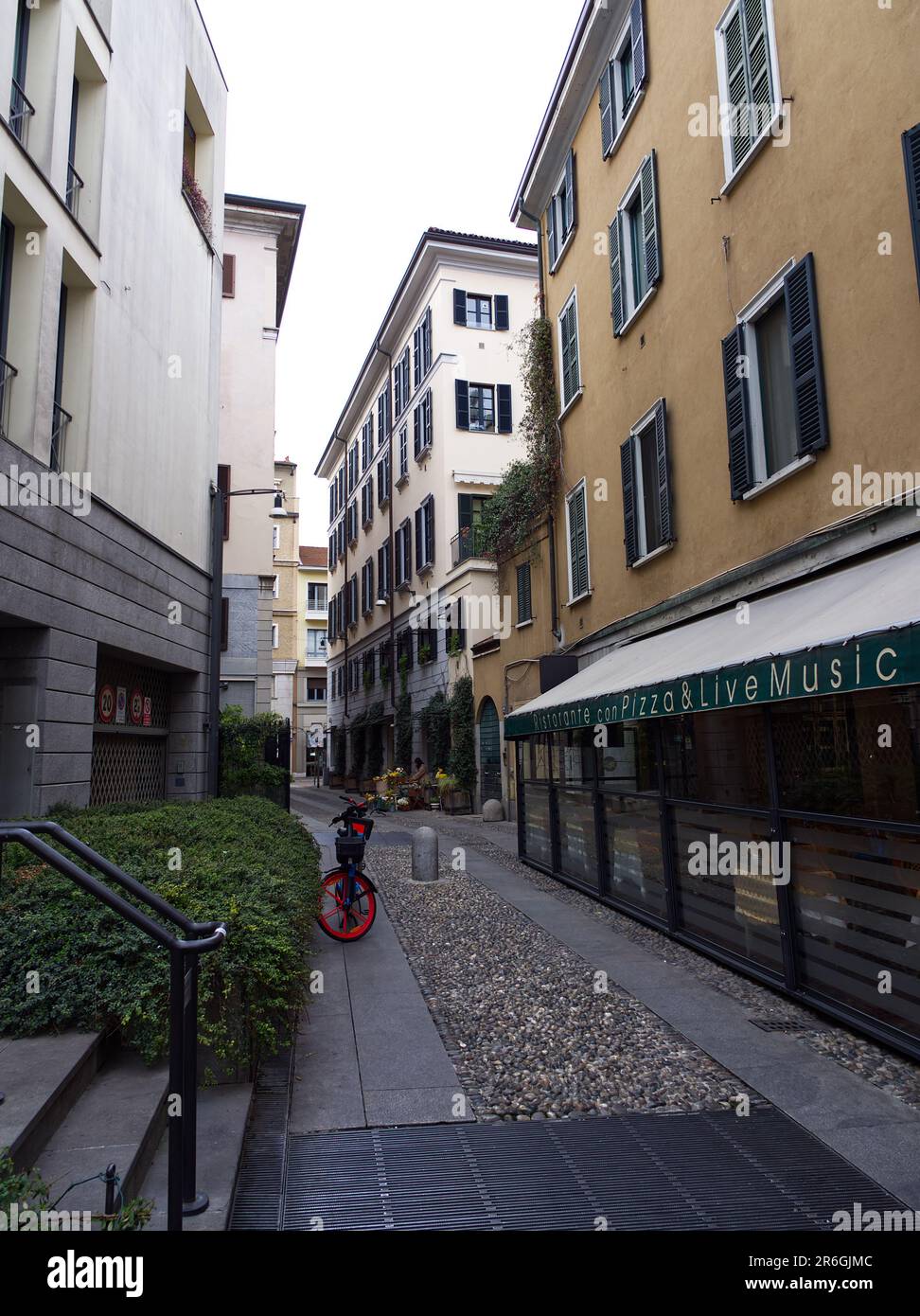 Italian building facade in spring, Milan, Italy Stock Photo - Alamy