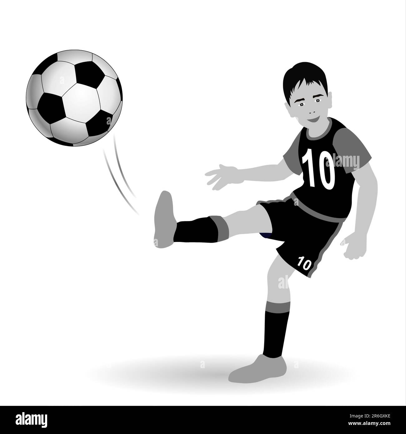 Soccer ball player kicking the ball on a white background Stock Photo