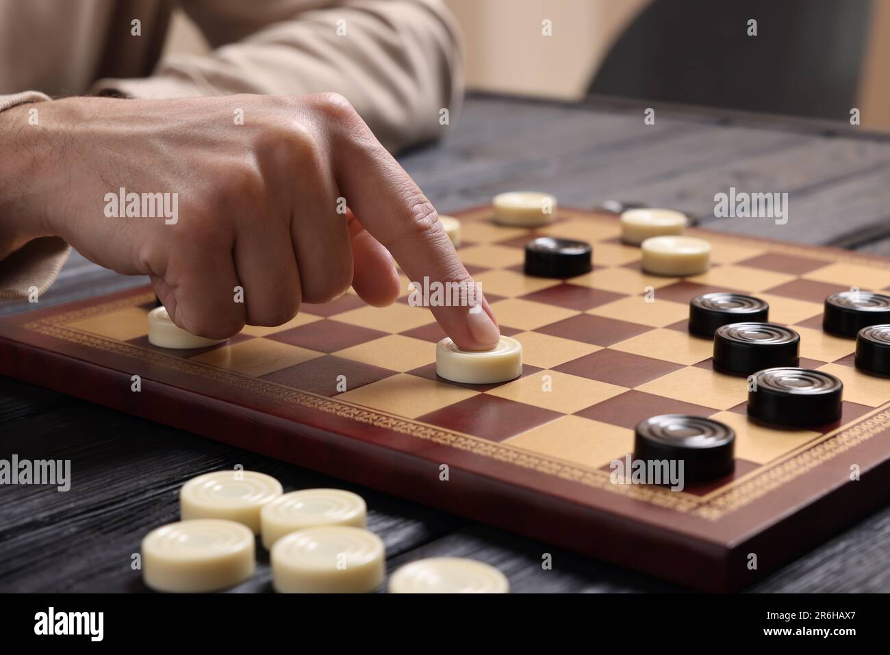 Senior man thinking about his next move in a game of chess Stock Photo by  dmytros9