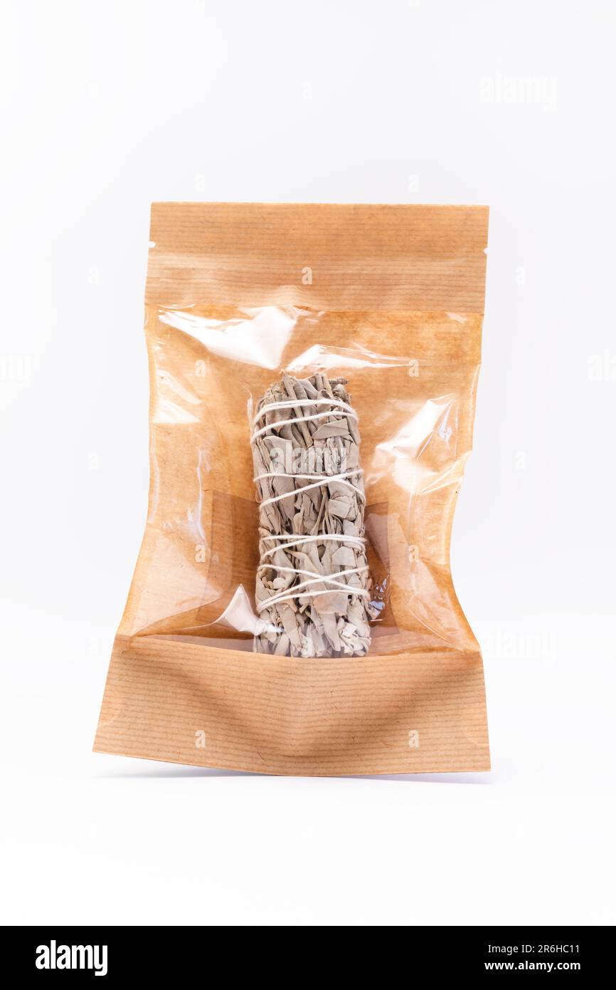 Isolated White Sage Smudge Stick In Paper Package On White Background