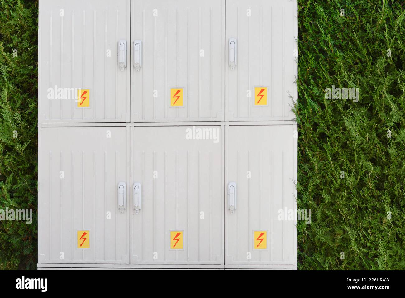 Electrical power panel near green hedge outdoors Stock Photo Alamy